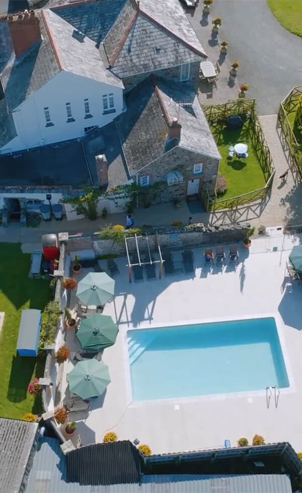 Broomhill Manor luxury Holiday Cottages for Rent Bude North Cornwall pool area Portrait