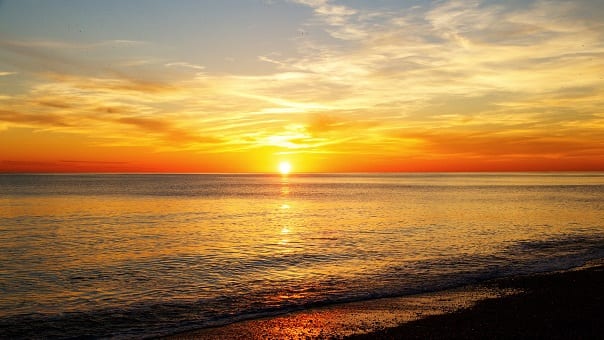 Sun setting over the sea Sun setting over the sea